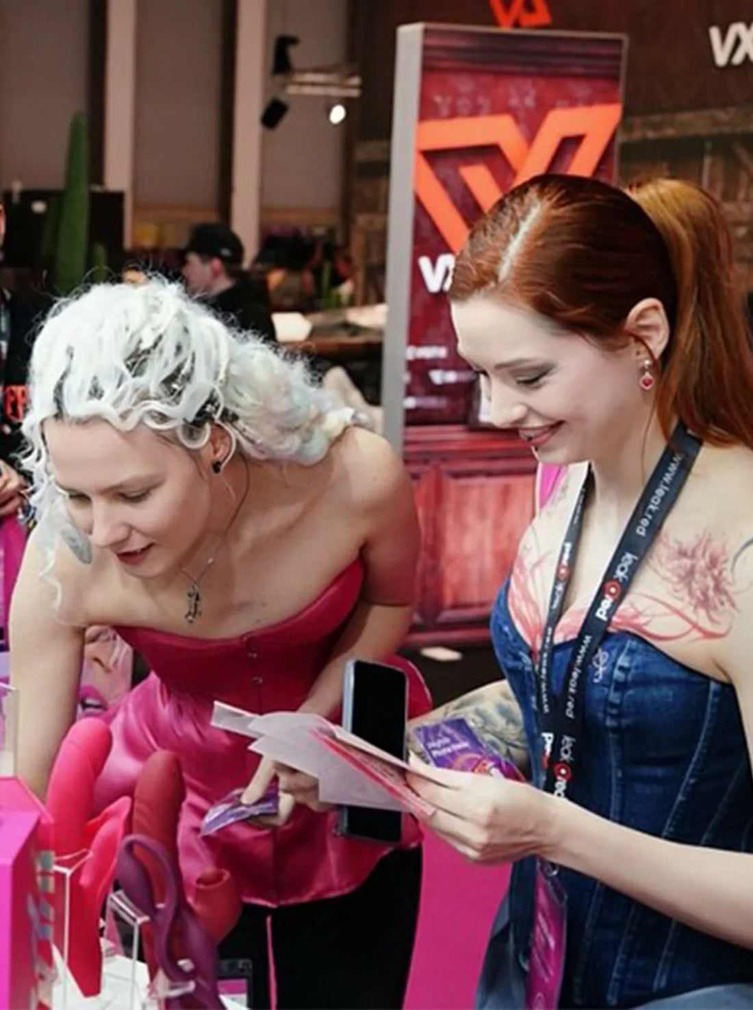 Two girls visiting Toendi at Germany Expo