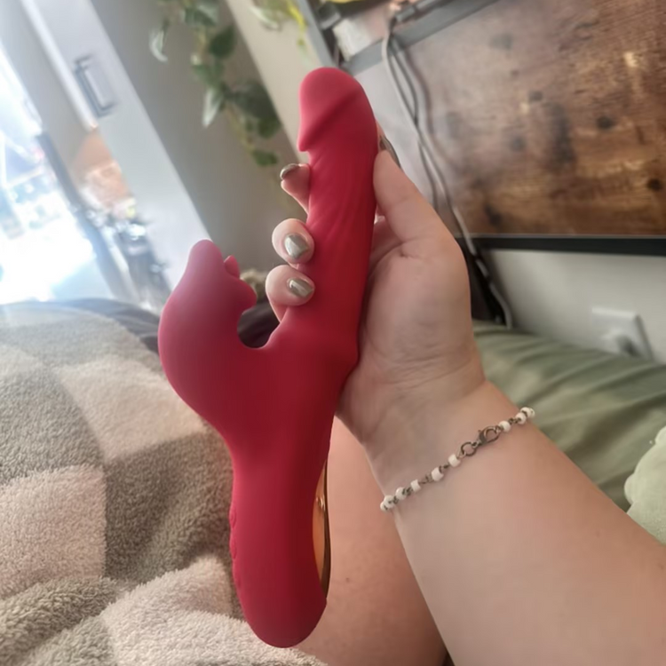 A real-life photo of a Toendi user using a vibrator