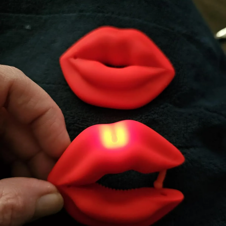 A real-life photo of a Toendi user using a vibrator
