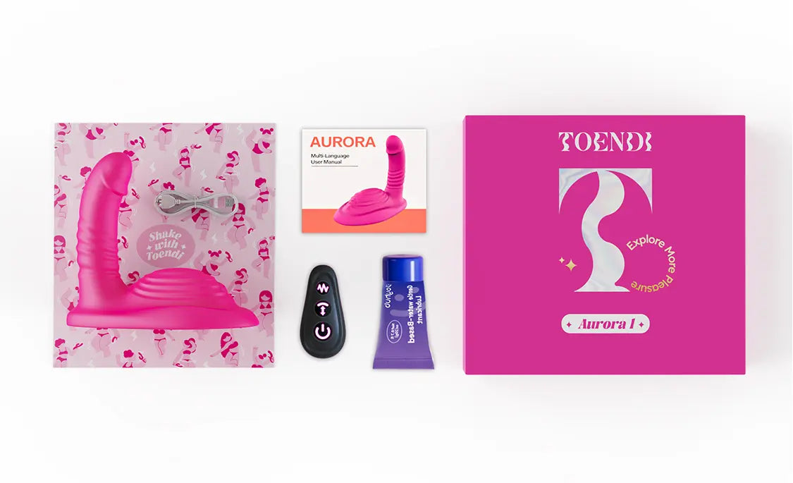 TOENDI Aurora pink riding vibrator with product packaging and included accessories