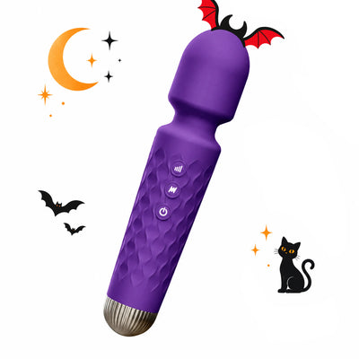 Toendi Vellum purple mini wand vibrator with a textured handle and Halloween bat decorations