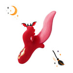 Toendi Veeelips red and pink dual-arm vibrator with gold accents and Halloween decorations