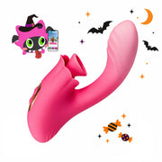 Toendi Vitality pink dual-arm vibrator with a curved textured shaft and Halloween decorations