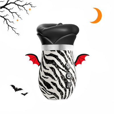 Toendi Zera Lips vibrator with a zebra-print body, black lip-shaped top and Halloween bat wings